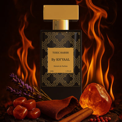 Perfume bottle labeled 'Toxic Harbui by Khyaal' with flames and spices on a dark background